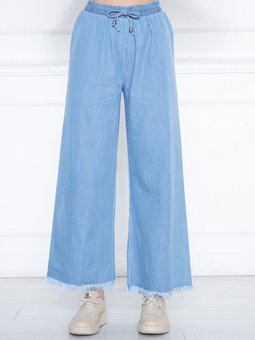 Mavi Yazlık Paçası Püsküllü Ve Önü Bağcıklı Şık Trend Yıkamalı Salaş Kot Pantolon