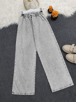 Bol Paça Beli Lastikli Bağcık Detaylı Kot Pantolon