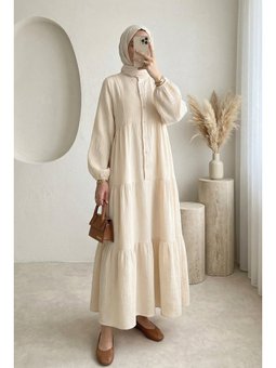 V Yaka Yarım Düğmeli Kolu Lastikli Parçalı Müslin Taş Elbise